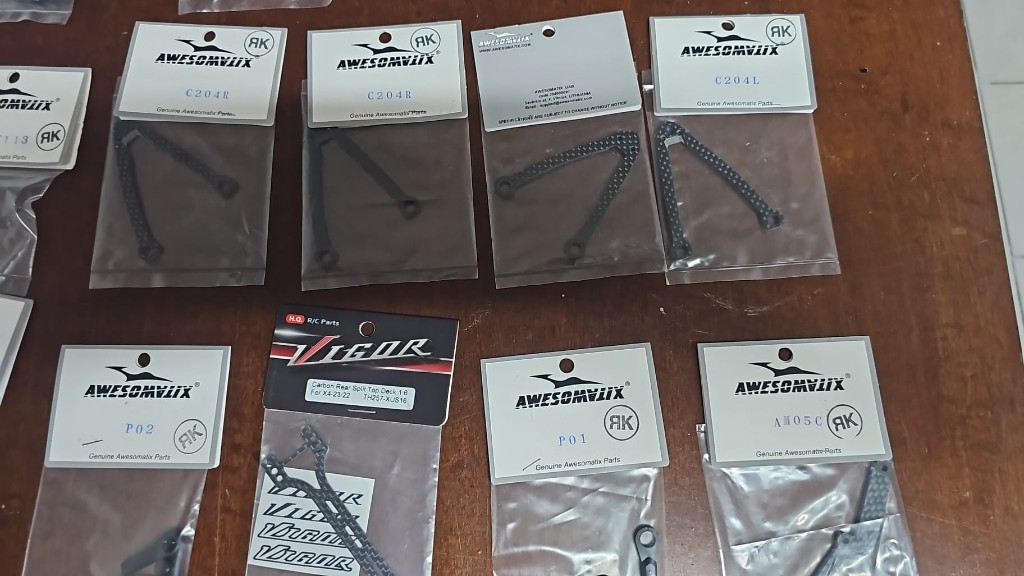 Lotto ricambi Awesomatix A800 (compatibili MMX / R / RR) + carbon Vigor